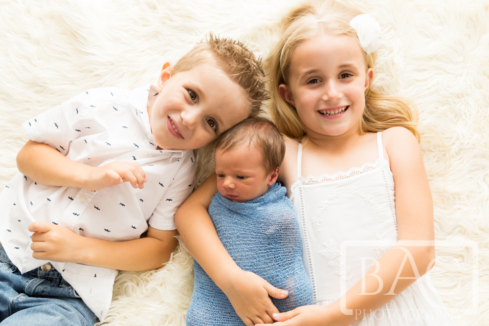 Newborn Portrait with 2 siblings