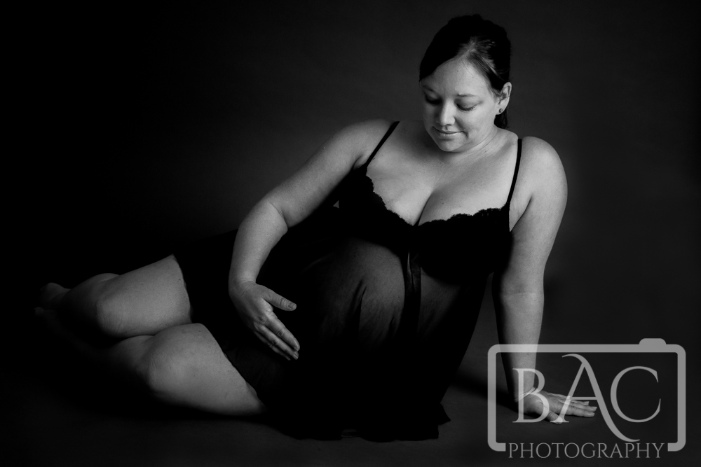 black and white maternity portrait sitting