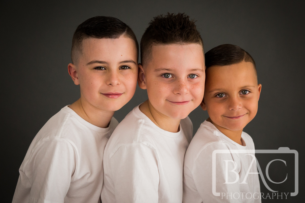 Three brothers sibling portrait