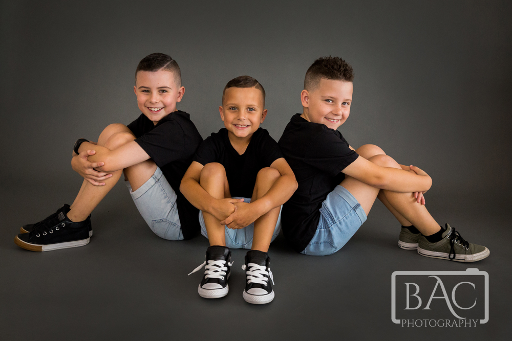 Three brothers sibling portrait