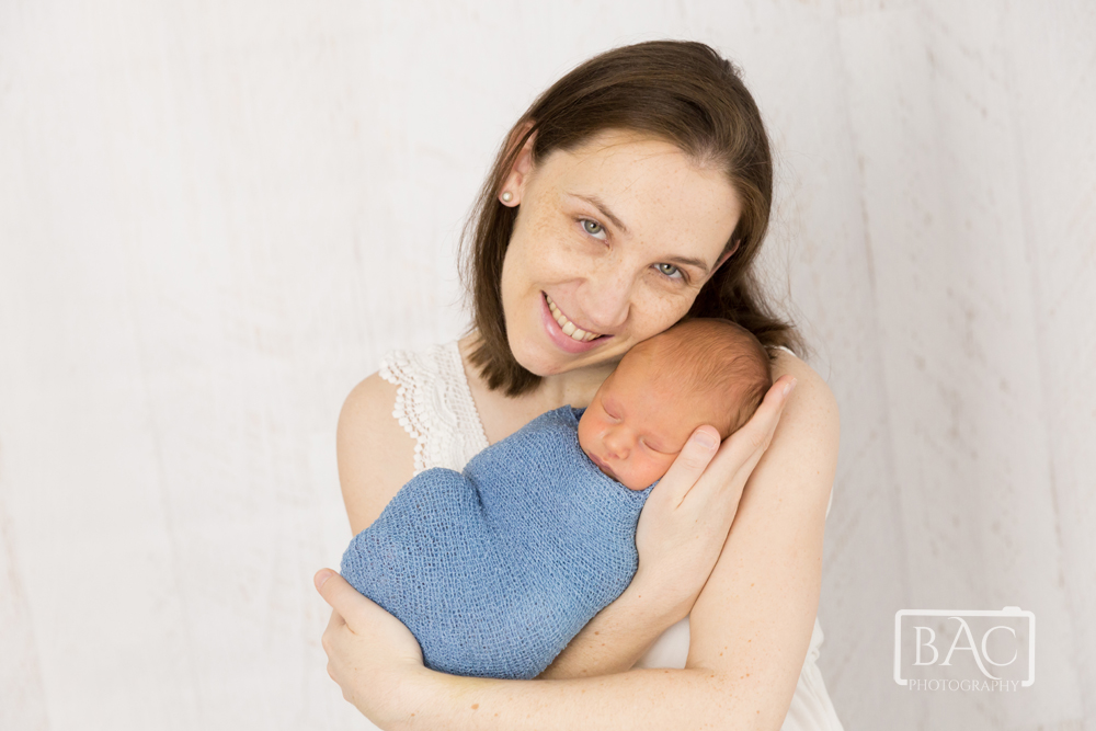 Newborn portrait of Mum with 10 day old son