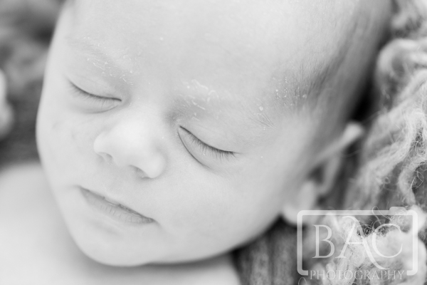 Black and white newborn close up