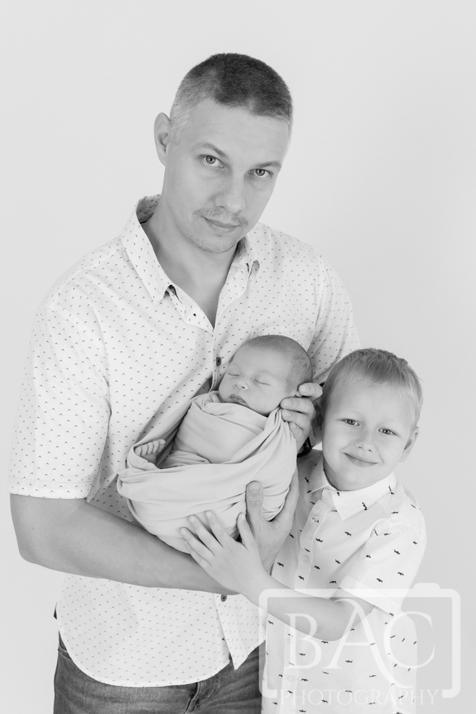 Dad with 2 sons newborn portrait