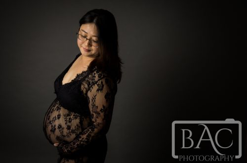 Maternity portrait with black lace gown