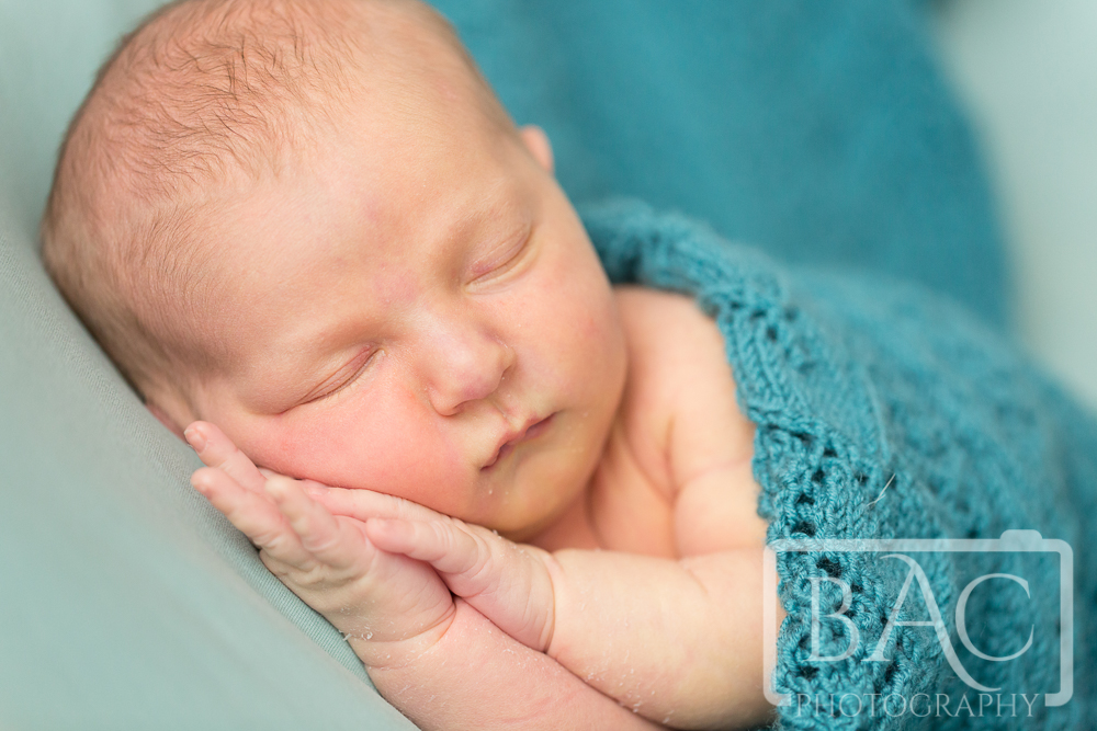 Close up Newborn Portrait on green blanket