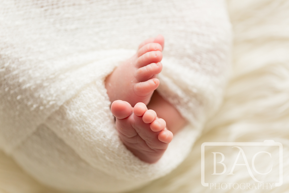 Newborn feet wrapped up