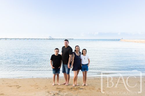 Outdoor family portrait on the beach at Shroncliffe