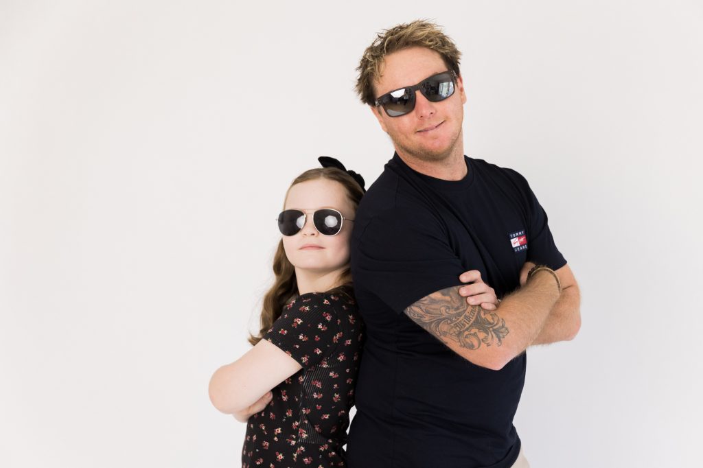 cool dad and daughter portrait in studio