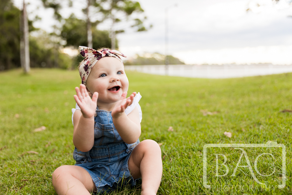 gorgeous baby portrait outdoor on the grass
