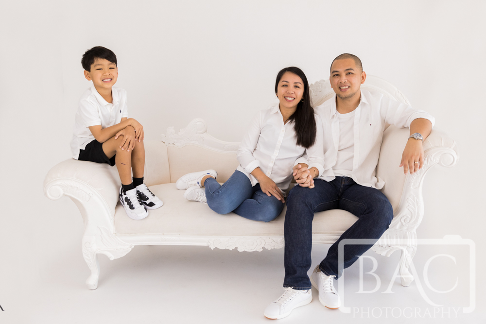 studio family portrait session relaxing on the couch