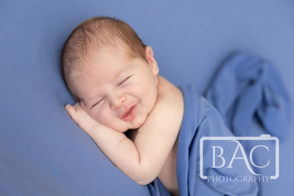giggle newborn portrait